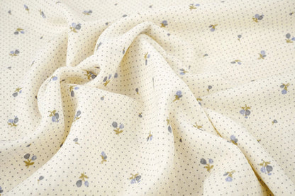 Cotton muslin with tiny flowers and dots - available online at Charlotte Fabrics