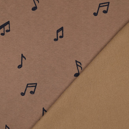 Image de maille en coton molletonnée - musique 285 g/m² – disponible chez Tissus de Charlotte
