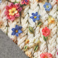 Attēls ar Kokvilnas siltināta trikotāža|Alpen fleece| - pīnes ar ziediem 340 g/m² – pieejams Šarlotes audumi