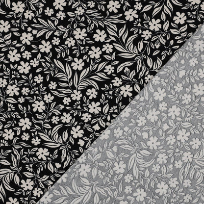 Image de jersey coton - fleurs blanches sur fond noir 200 g/m² – disponible chez Šarlotes audumi
