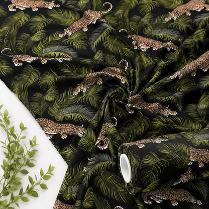 Image avec jersey de coton - feuilles et léopards 220 g/m² – disponible chez les tissus de Charlotte