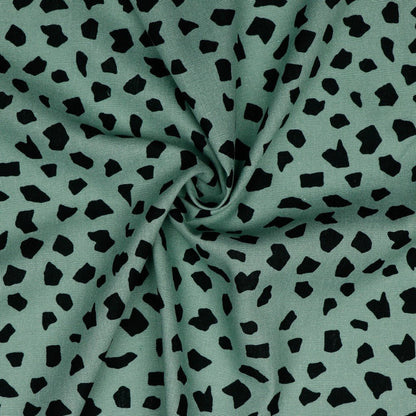 Linen with viscose - black dots on a dark mint background 180 g/m²