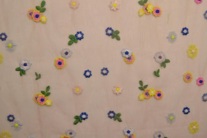 Embroidered tulle fabric with flowers - peach tone 70 g/m²