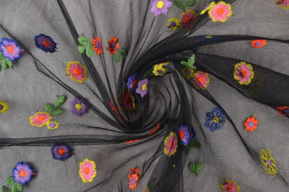 Embroidered tulle fabric with flowers, black tone 70 g/m²