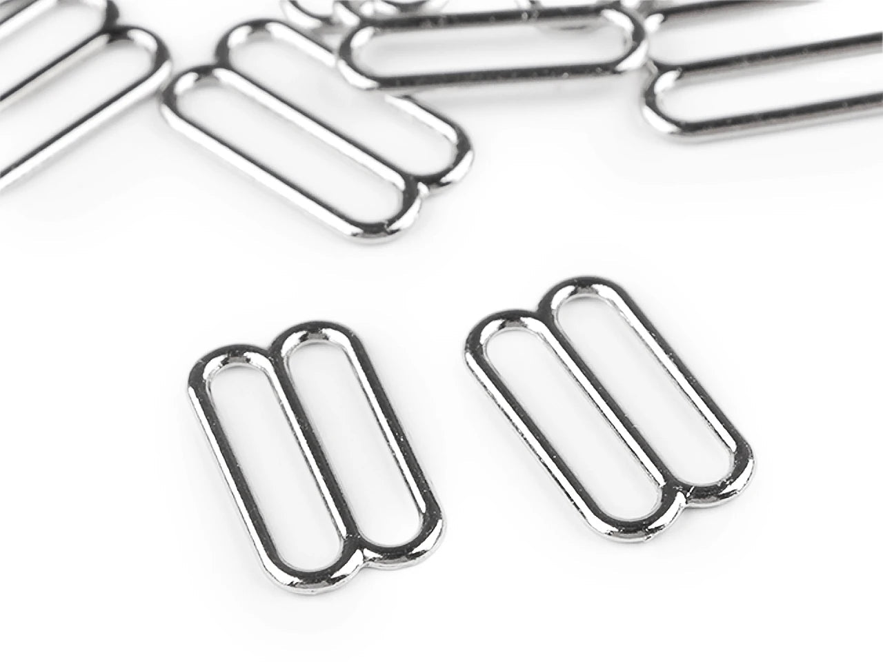 Attēls ar Metāla regulatori krūšturiem / lencēm — 15 mm|20 gb – pieejams Šarlotes audumi