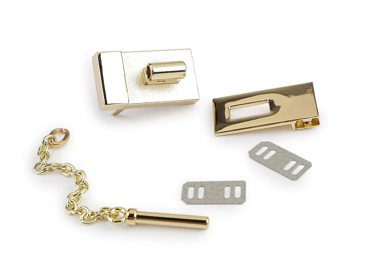 Metal bag clasp with chain 25 × 58 mm – available online at Šarlotes audumi