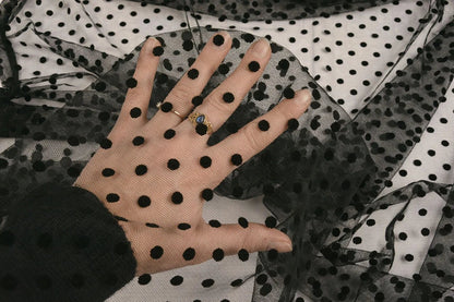 Soft tulle with velvet dots - black, available online at Charlotte's Fabrics