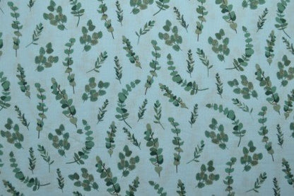 Muslin - eucalyptus on a blue background 140 g/m²