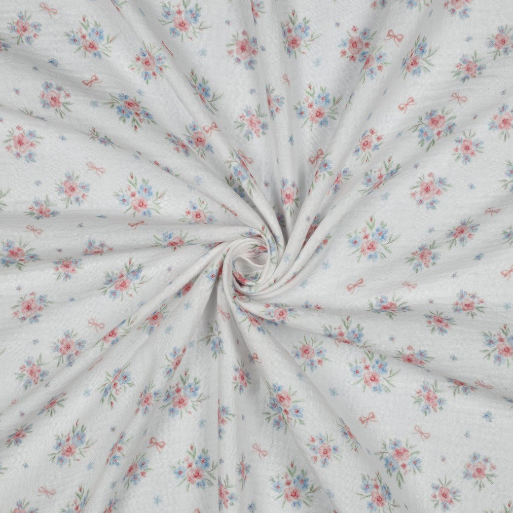 Attēls ar Muslīns - puķītes un bantes 120 g/m² – pieejams Šarlotes audumi