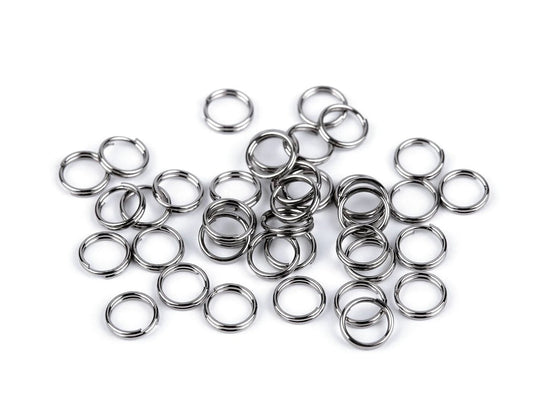 Attēls ar Nerūsējošā tērauda savienojošie gredzeni (split jump rings) Ø6 mm 10 g – pieejams Šarlotes audumi