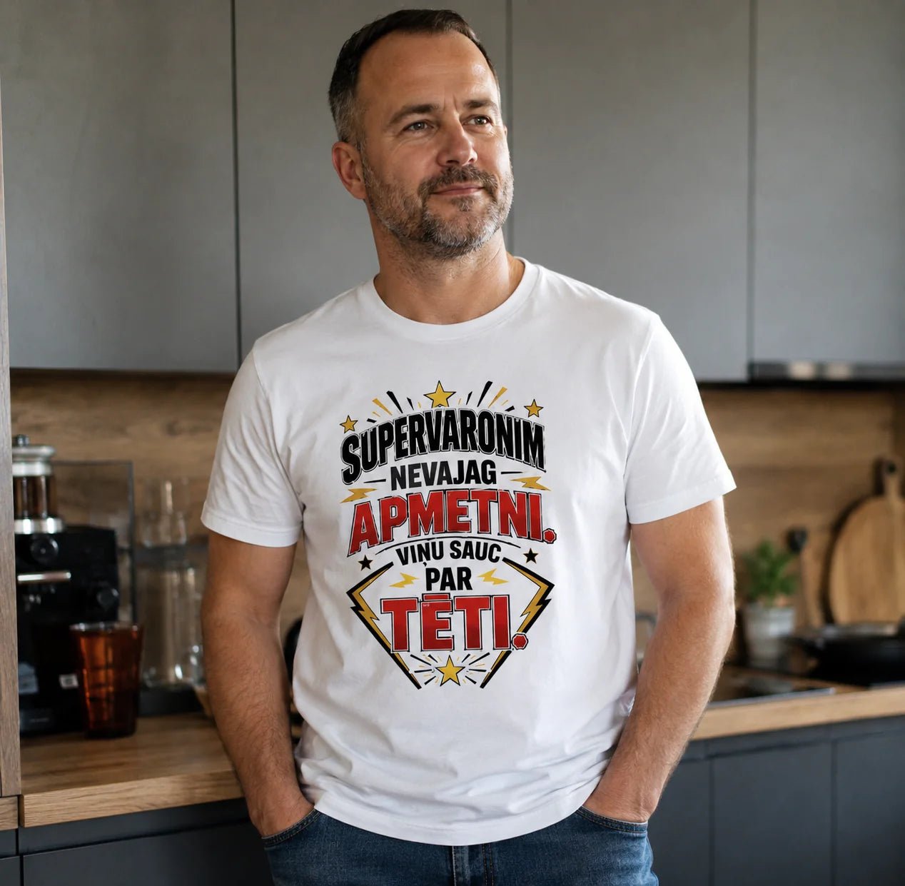 Image of an organic cotton T-shirt, “A superhero doesn’t need a cape. He’s called Dad.” — available online at Šarlotes audumi
