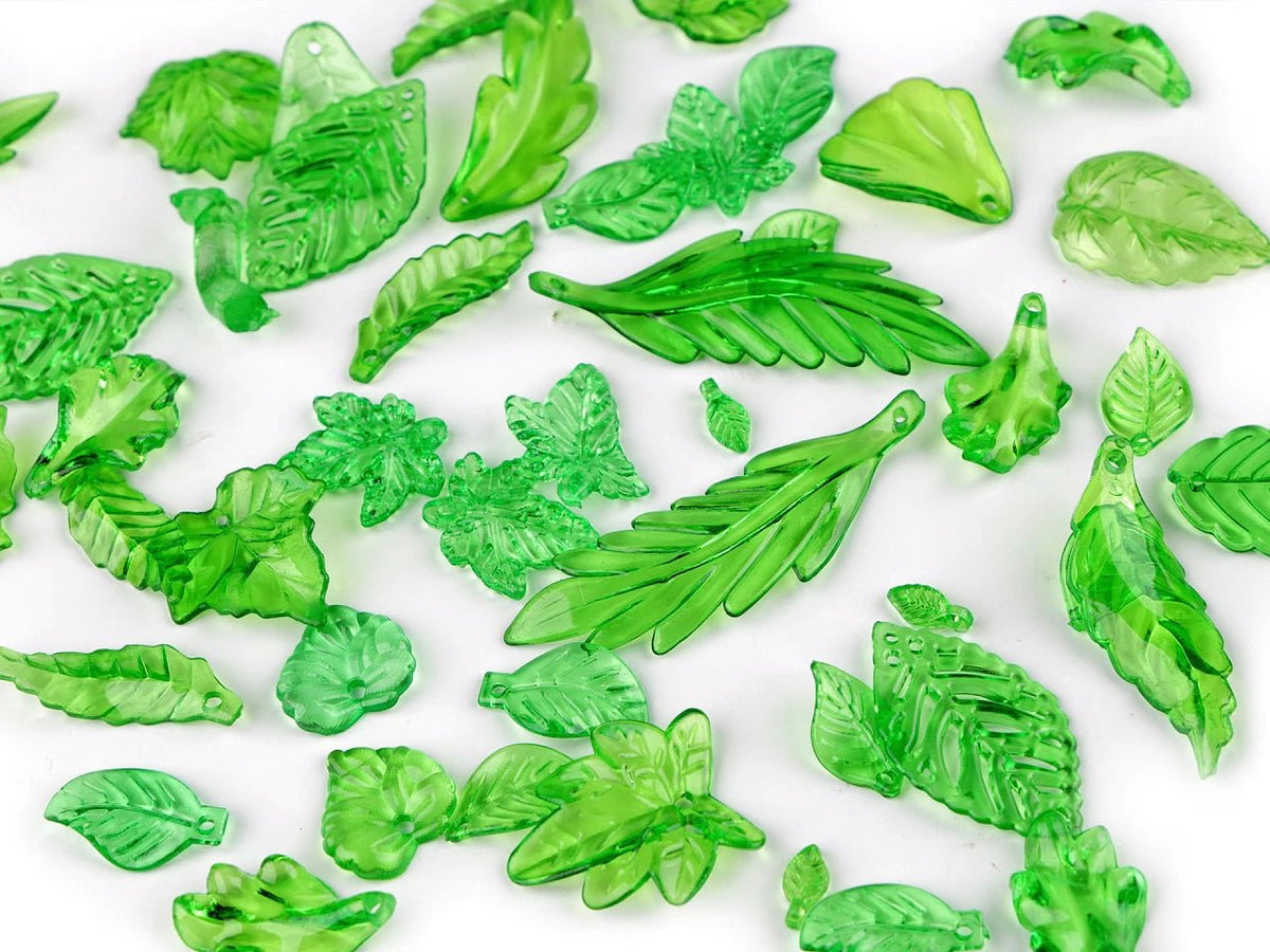 Image of plastic leaf beads – assorted shapes and sizes MIX – available online at Šarlotes audumi