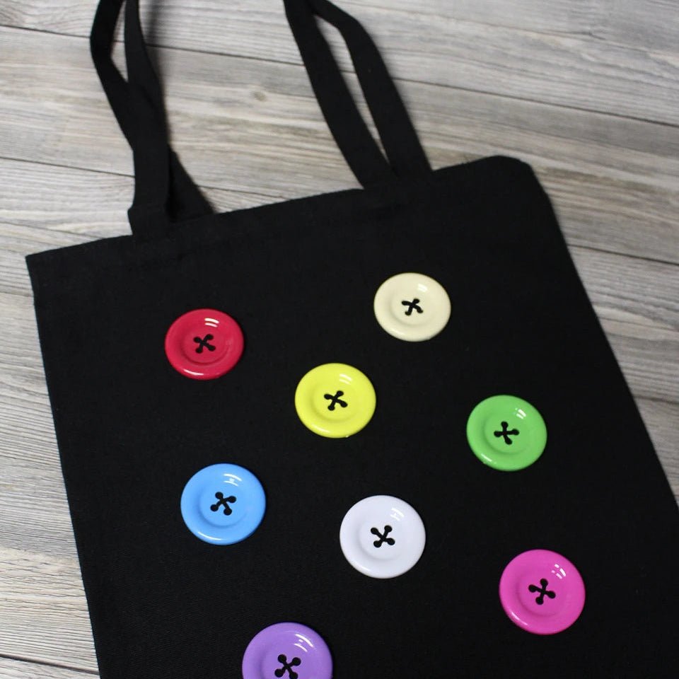 Attēls ar Plastmasas pogas 50 mm - baltas – pieejams Šarlotes audumi