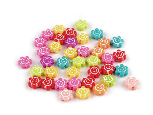 Attēls ar Plastmasas ziedu pērlītes Ø11 mm 10 g | dažādu toņu – pieejams Šarlotes audumi