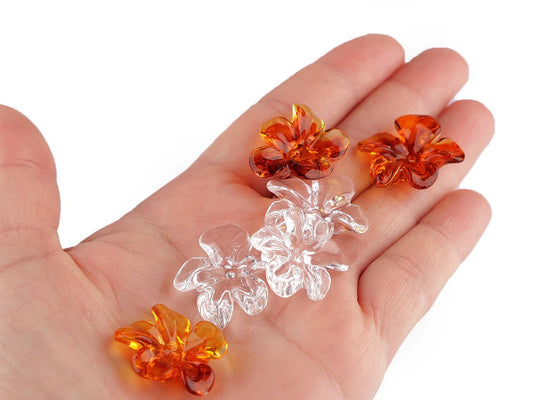 Image with plastic flower beads Ø25 mm – available online at Charlotte Fabrics