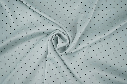 Satin avec élasthanne - pois sur fond menthe 90 g/m²