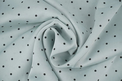 Satin stretch à pois sur fond menthe 90 g/m²