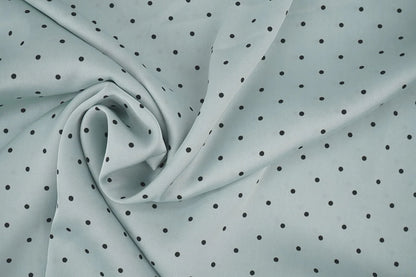 Satin avec élasthanne - pois sur fond menthe 90 g/m²