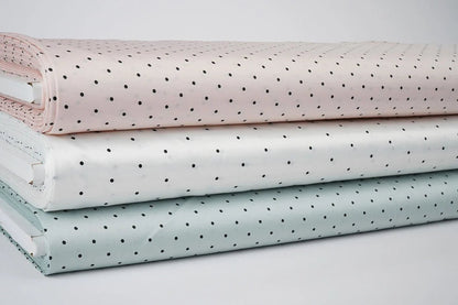 Satin avec élasthanne - pois sur fond menthe 90 g/m²