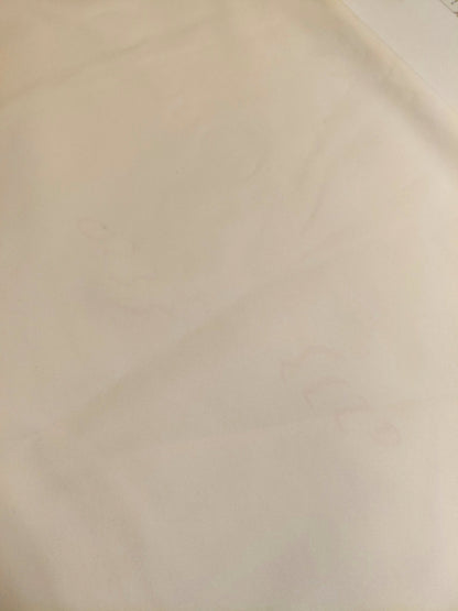 Attēls ar Softshell audums ar defektu -kremīgi balts 300 g/m² – pieejams Šarlotes audumi