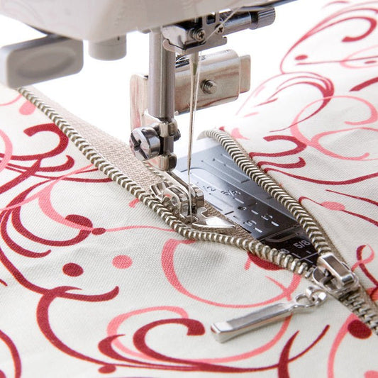 alt
Image of a sewing machine foot - double-sided, narrow for sewing in zippers, high shank – available at Šarlotes audumi