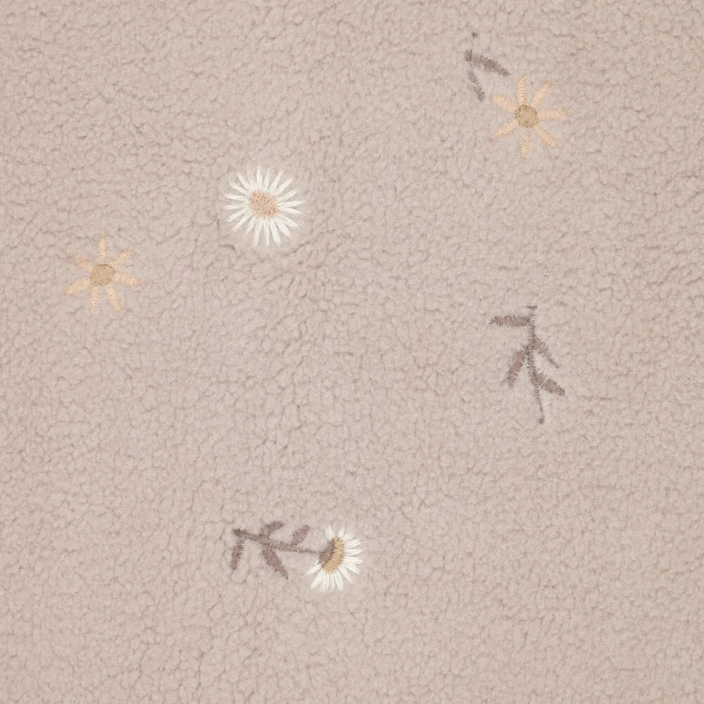 Image of Teddy fleece-embroidered flowers on a beige background – available online at Charlotte's Fabrics