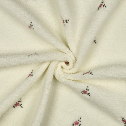 Teddy fleece, warm white, with embroidery – available online at Šarlotes audumi