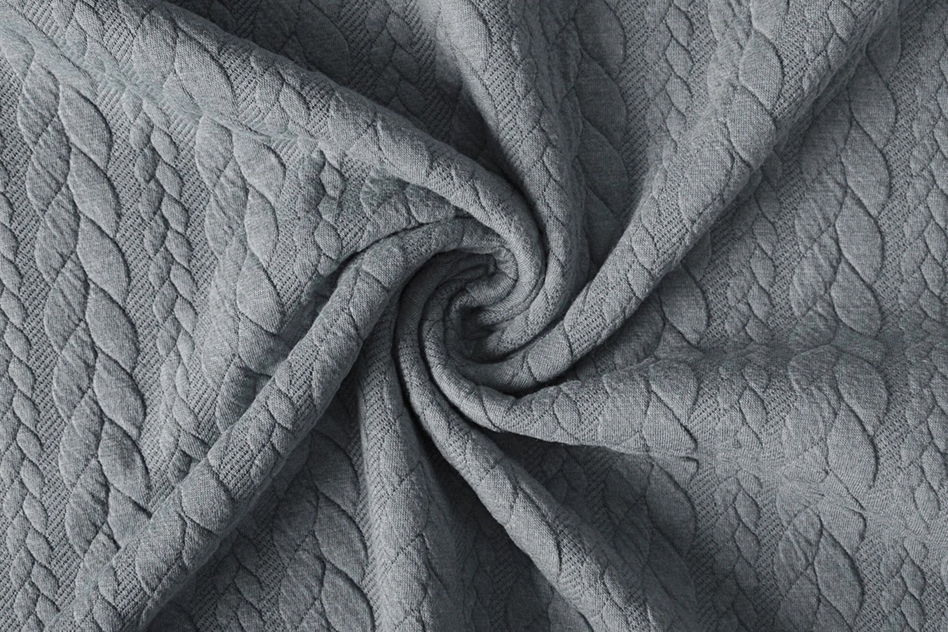 Attēls ar Trikotāžas audums ar adījuma rakstu - pelēkas pīnes 340 g/m² – pieejams Šarlotes audumi