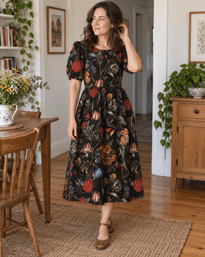 Viscose gabardine fabric with flowers on black – available online at Šarlotes audumi