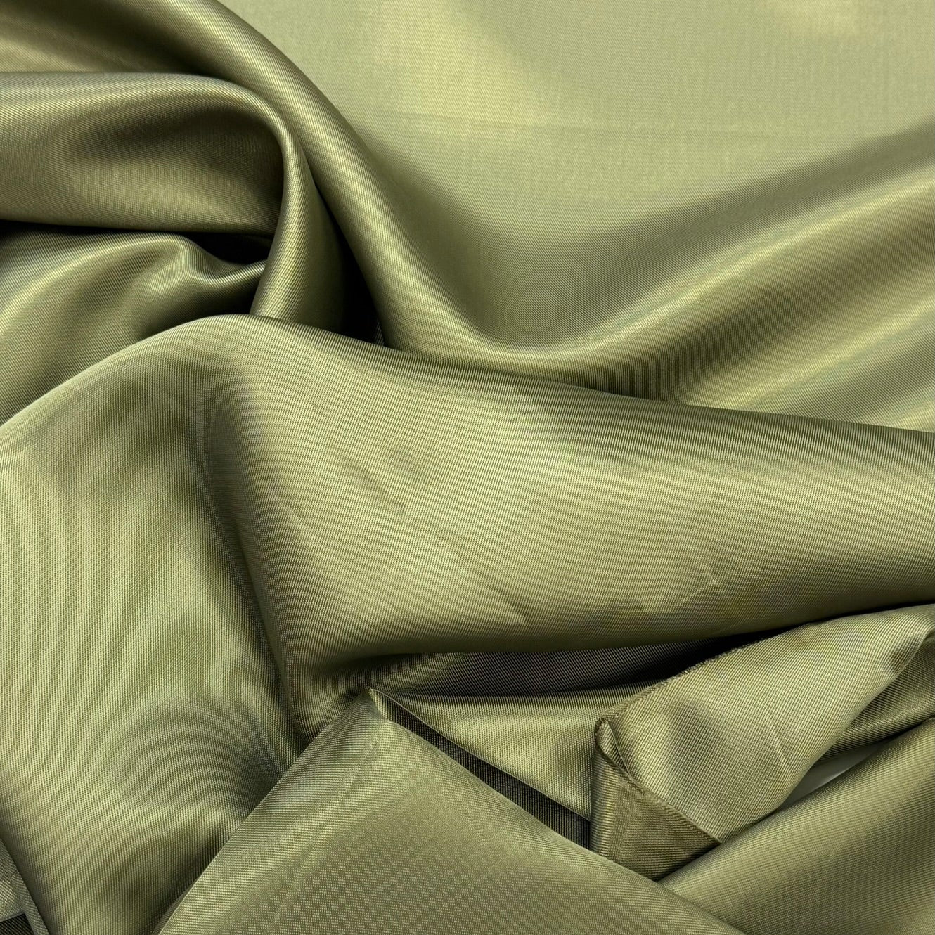 Attēls ar Viskozes oderes audums - olīvkrāsas 85 g/m² – pieejams Šarlotes audumi