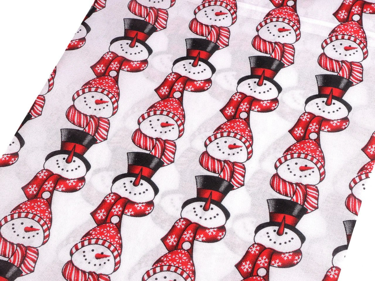 Image of a Christmas gift bag with a snowman 30 × 40 cm – available online at Šarlotes audumi