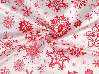 Image of Christmas satin fabric with snowflakes – available online at Šarlotes audumi