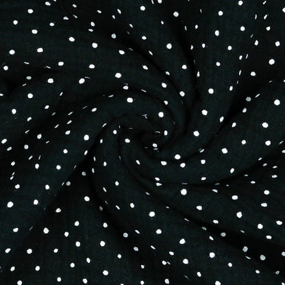 Mousseline à pois sur fond noir 125 g/m²