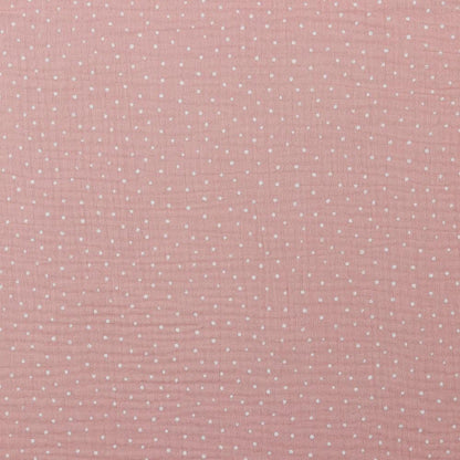 Mousseline à pois sur fond rose 125 g/m²