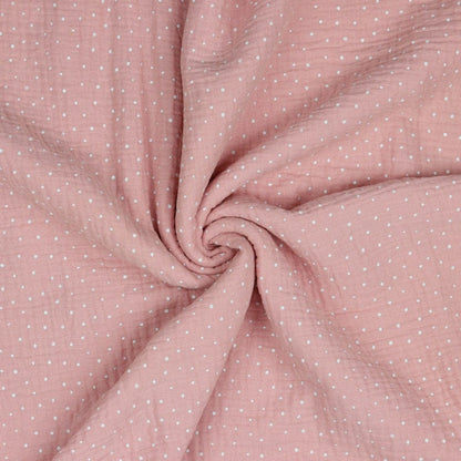 Mousseline à pois sur fond rose 125 g/m²